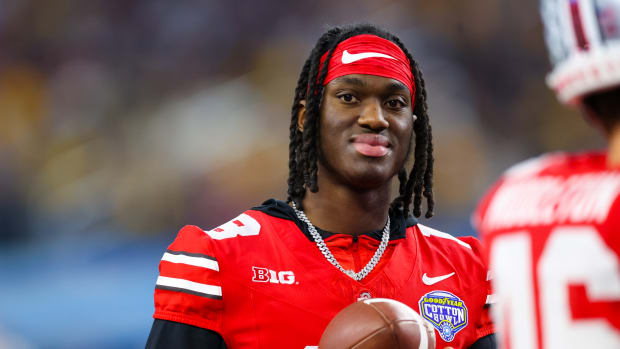 Ohio State Buckeyes wide receiver Marvin Harrison Jr. (18) looks on during the second half against the Missouri Tigers at AT&T Stadium.